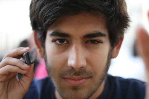 Aaron Swartz, holding a knife pointed at the camera, in Florence / CC-BY