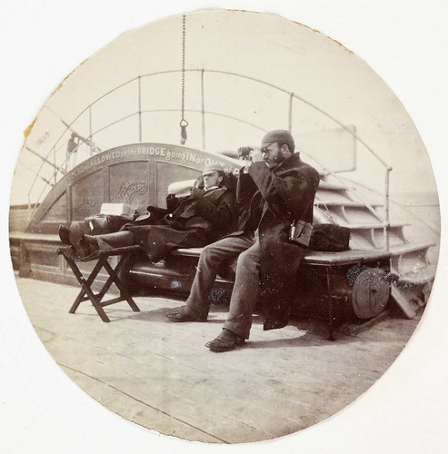 Two men on the deck of a ship