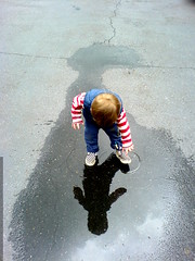discovering his reflection in a puddle   DSC00833 