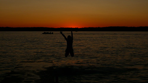sunset water swimming cottage