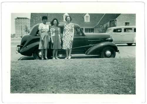 three women and a car
