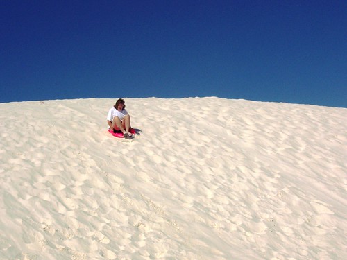 people newmexico desert whitesands sledding kittie