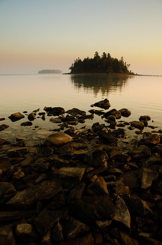 sunset lake island islands still rocks michigan huron drummond