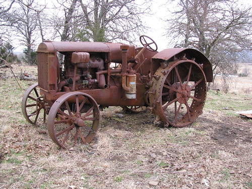 old tractor abandoned rust rusty machinery resting decayed oldiron