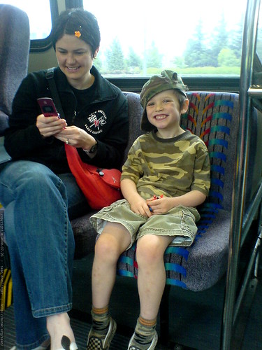 rachel and nick on the bus to the airport terminal   DSC01566
