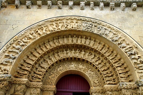 17 sud portail babylone artroman modillon voussure saintpierredaulnay views1881 poitouroman