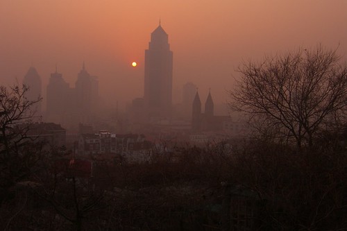 china sunset red sun fog skyscraper smog dusk qingdao shandong dpn