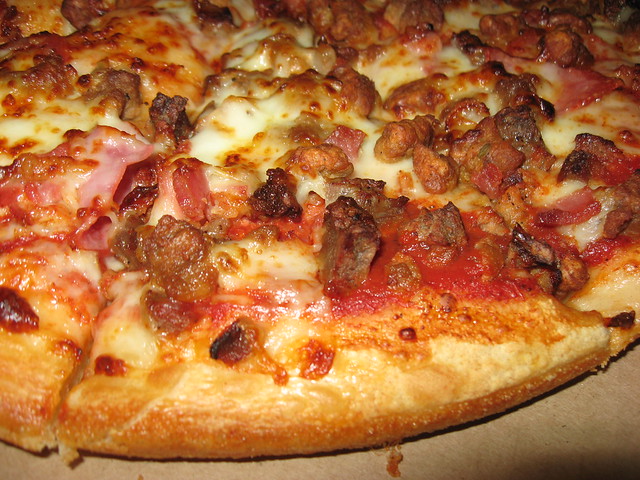 Pizza Hut: Meat lover's pizza (close up) - a photo on ...