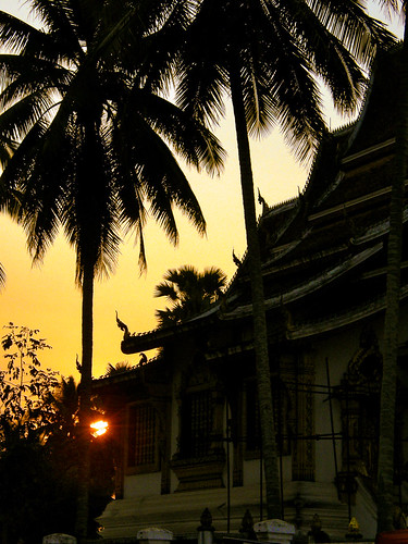 Sunset behind temple in Luang Prabang