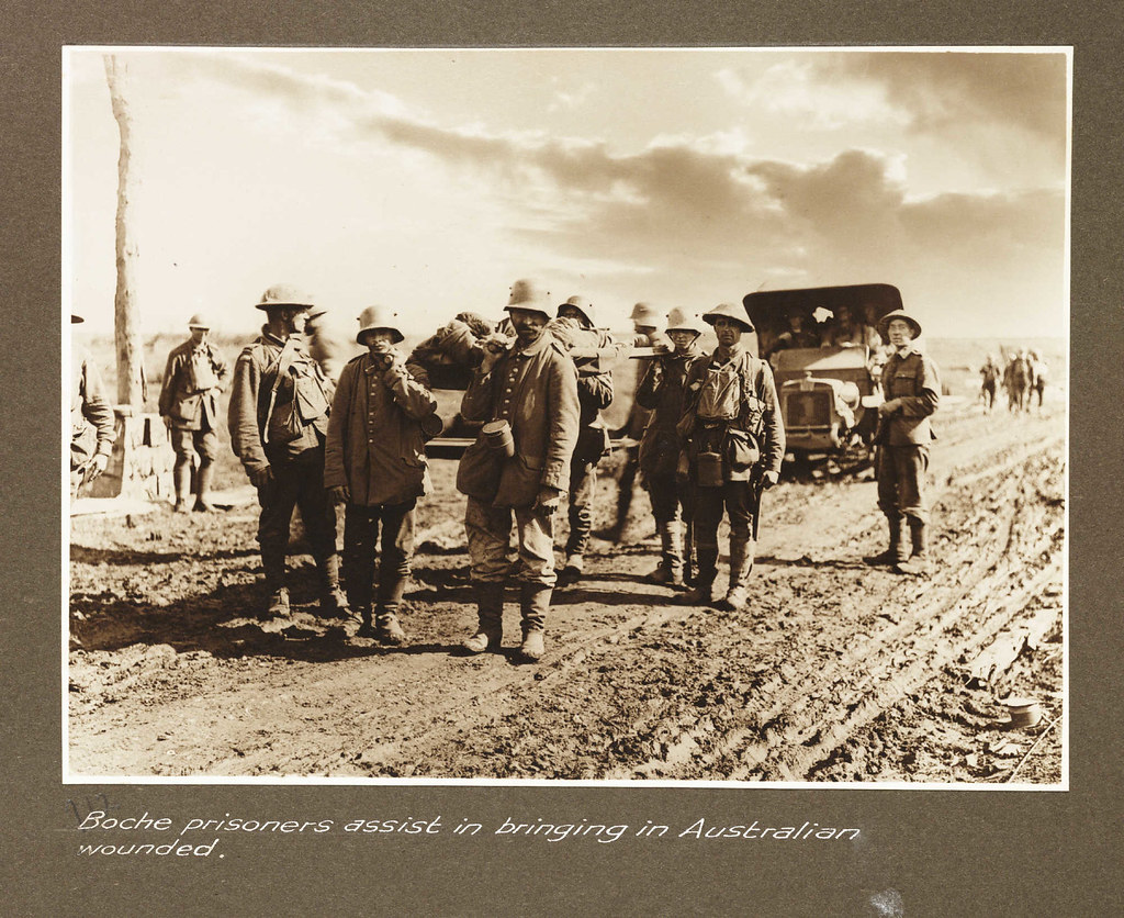 Boche prisoners assist in bringing in Australian wounded