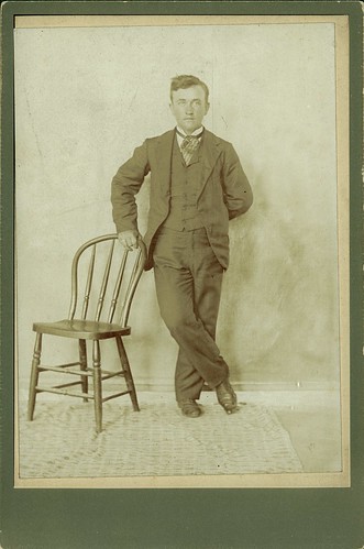Man and kitchen chair