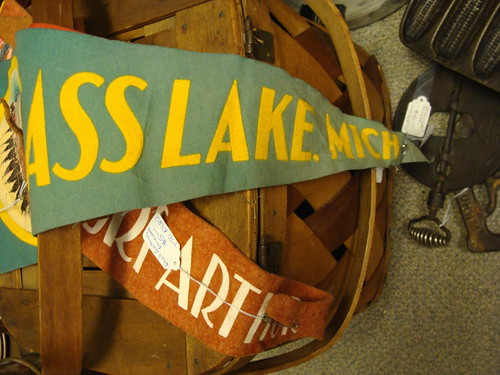 old vacation lake holiday green ass yellow junk basket random antique michigan flag banner used souvenir stuff secondhand item asslake theremayormaynotbeamissingcatthefrontofthat coryfunk
