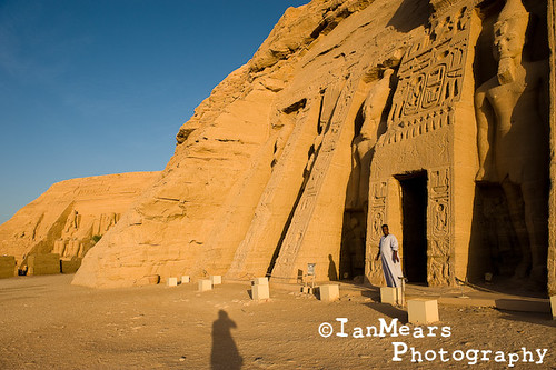 people sunrise buildings temple ruins egypt style location heiroglyphics abusimbel