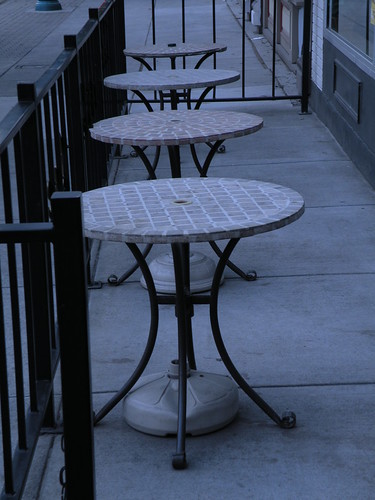 metal cafe iron sidewalk tiles tables
