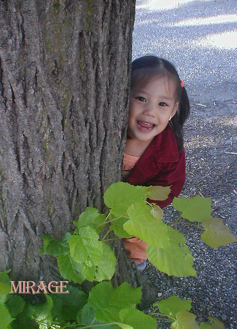kid behind tree, kids' portrait, Why It’s Important to Have/Take Your Kids' Portraits As Often As You Can