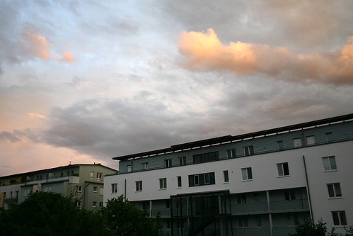 freiburg rieselfeld germany 200807 tillwe building architecture sunset sky pink clouds yellow