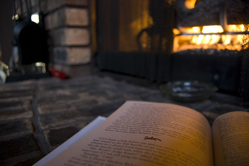 christmas reading book fireplace hearth