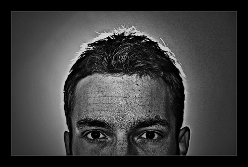 portrait blackandwhite bw selfportrait me face dark 50mm eyes symmetry hidden sp frame symmetrical peek hiding peeking inthedark 40d fringelight davidkonecny