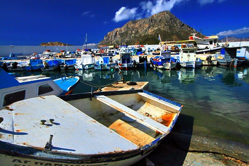 ocean travel blue summer vacation seascape haven nature water boats greek islands harbor wooden fishing marine mediterranean skies outdoor traditional aegean scenic hellas location greece coastal maritime attractive environment ports hamlet harbours kalymnos dodecanese caiques telendos