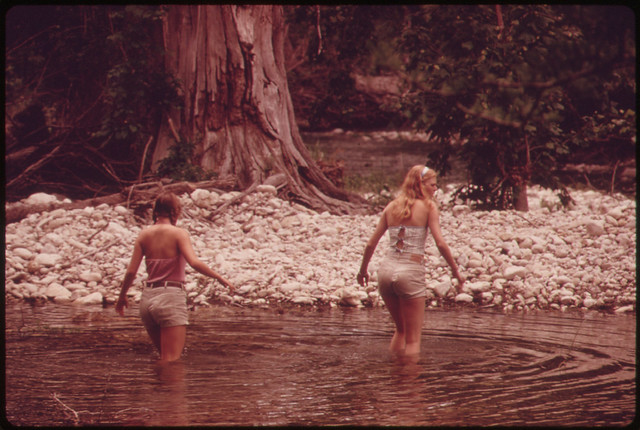 Teenage Girls Wading the Frio Canyon River near Leakey Texas, While on an Outing with Friends near San Antonio 05/1973