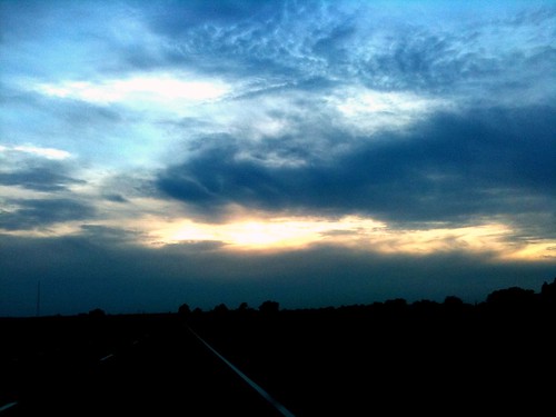 road blue sunset sky orange nature face weather clouds dark evening highway may anthropomorphism iphone iphoneography