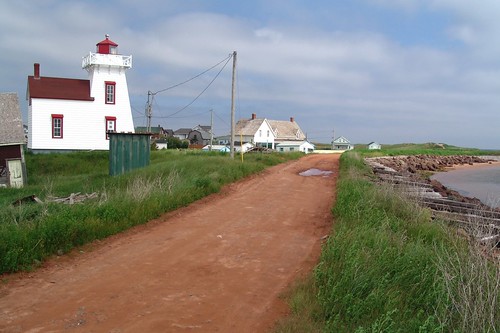 red lighthouse white canada pei northrustico