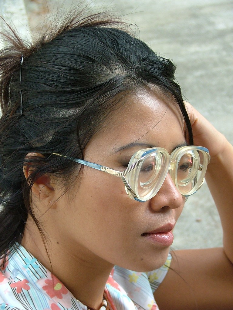 Loony - cute girl wearing some vintage large glasses with thick lenses ... People With Thick Glasses
