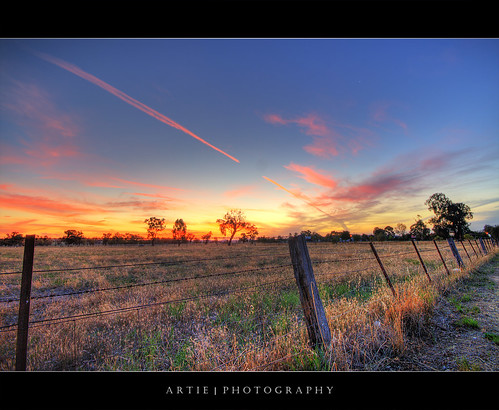 sunset red sky field clouds photoshop canon bravo cs2 farm tripod fences australia wideangle newsouthwales grasses poles 1020mm flaming hdr artie waggawagga 3xp sigmalens photomatix tonemapping tonemap 400d rebelxti