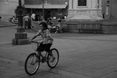 sardegna blackandwhite bw bike square nikon sardinia child bn riding piazza biancoenero bicicletta oristano bambino blackwhitephotos d40x