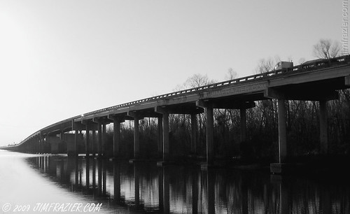 road street trip travel bridge trees sunset blackandwhite bw lake water monochrome forest landscape concrete evening la vanishingpoint highway louisiana scenery technology atchafalaya dusk scenic parks structures bridges engineering manipulation roadtrip business swamp infrastructure highways desaturated interstate traveling roadside february s60 2009 q3 causeway crossings wetland spans visitorcenter reststops civilengineering interstate10 v500 v1000 pullouts restareas waysides picnicareas infrastructue ld2009 ldfebruary 09022109c 20090220louisianaswing atchafalayavisitorcenter ©jimfraziercom wmembed fastpictures