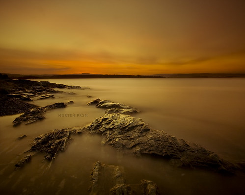 longexposure morning light red sea sky brown black color reflection beach nature water yellow norway clouds sunrise dark landscape island golden norge spring rocks cloudy skandinavien may norwegen wideangle explore motionblur shore mysterious noruega scandinavia peninsula 2009 goldenhour oslofjord bygdøy noorwegen noreg sigma1020mm skandinavia nd1000 nd30 bw110 canoneos40d nd1000x mortenprom