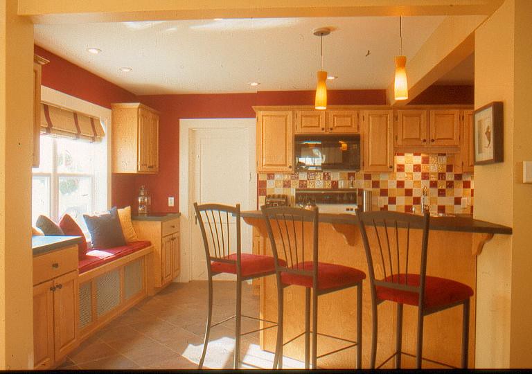 Kitchen with window seat with flair in this improved Halifax Home.