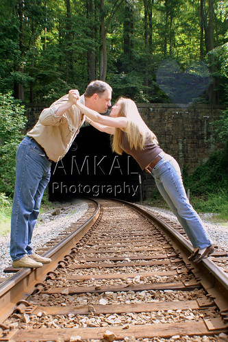 pictures railroad photography engagement picture casual project365 project36584 amkal iusedtohaveanightmareaboutatrainrunningthroughthesecondstoryofmyhouseblastingthroughthewallsofmyparentsbedroomandthenplowingthroughmineandmysisters lensflareheart project365061309
