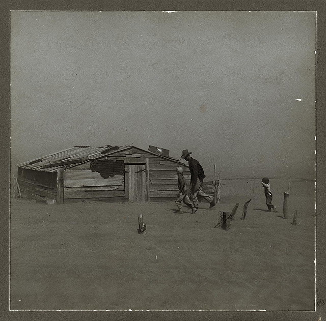 Farmer and sons walking in the face of a dust storm. Cimarron County, Oklahoma (LOC)