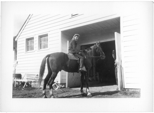girl on horse by barn 02 030