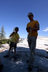 flynn & his dad with their rock climbing slings 