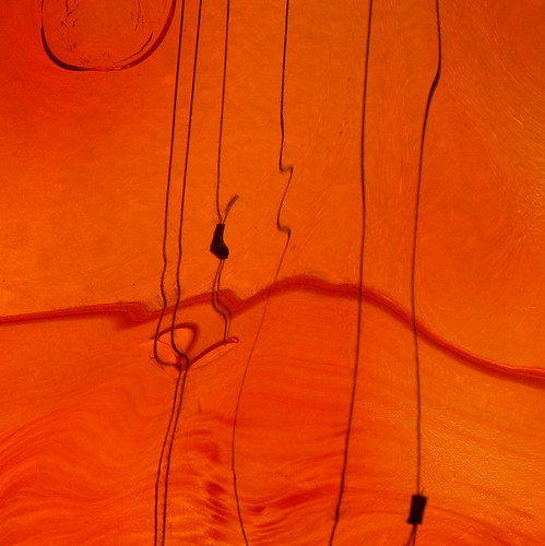 orange distortion glass bceplace threads barbera glassart unpredictability justimagine jeffburnette brookfieldplace 080011 suspendedlayeredglassdisks ministractpotd