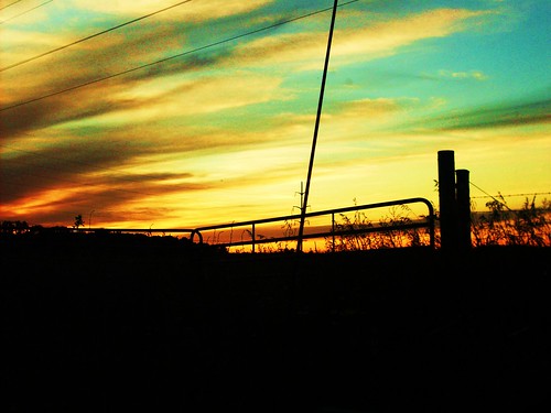 sunset clouds fence michigan farm north traverse silverlake powerline traversecity feild andrewpastoor