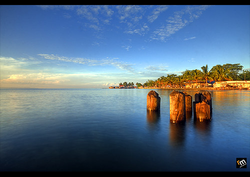 ocean trip travel blue trees light sea vacation sky sun seascape color colour reflection tree art beach nature beautiful beauty smile clouds contrast photoshop sunrise canon landscape geotagged photography photo interestingness rocks exposure dof photos philippines explore pk frontpage canoneos hdr highdynamicrange davao hdri blending waterscape rodel sigma1020mm mabuhay photomatix kadayawan tonemap specialpicture colorphotoaward aplusphoto pinoykodakero colourartaward perfectescapes rodelicious ifolio garbongbisaya redmatrix rodeljoselitomanabat gettyimagesphilippinesq1 gettyimagesasia gettyimagesphilippines