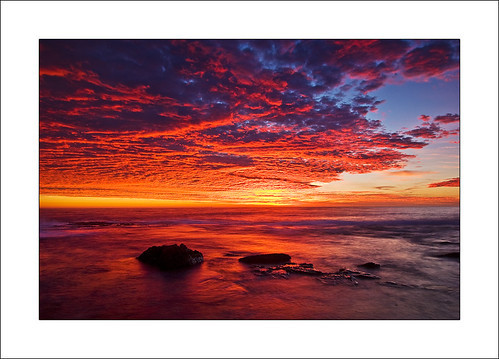 ocean morning red sky water colors clouds sunrise d50 dawn early rocks colours australia nsw serene oranges submerged pinks bluebay 1224mmf4 vosplusbellesphotos