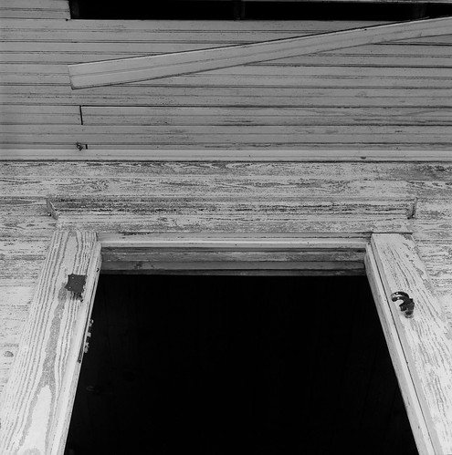 120 hasselblad tmax100 texas landscape scan wood coupland usa porch america west western door hinge slat dark entry exit paint old worn weathered house home building lintel header broken
