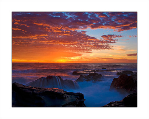 ocean morning sky water colors clouds sunrise d50 dawn early rocks waves glow colours australia nsw bluebay 1224mmf4