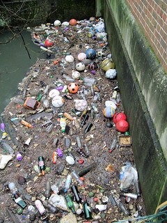 Debris and Pollution in the Duke of Northumberland's River, Kendall Bridge, Isleworth, London.