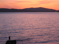 Alghero sunset and the fisherman