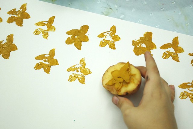 potato printing yellow stars