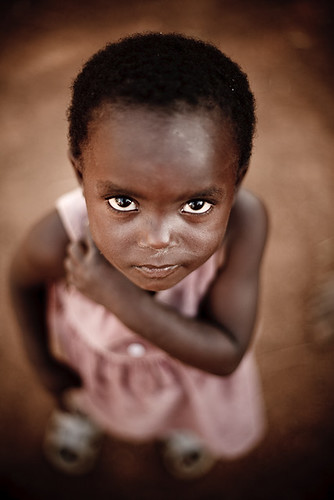 africa portrait brown color kids canon children tanzania 50mm kid eyes child dress purple 5d gaze img3934 kiabakari