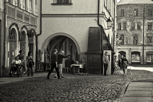 street city light shadow people bw sun architecture buildings germany walking deutschland town blackwhite spring wheelchair saxony arches goerlitz architectural direction sachsen april pointing oldtown cobbledstones cobbledstreet oldcenter canoneos400d andreeagerendy cobbledfloor gettyimagesgermanyq1
