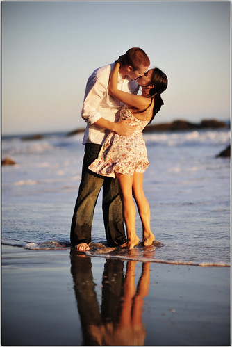 sunset woman man reflection beach engagement twilight kiss legs malibu passion sundress calves fiance christinamike