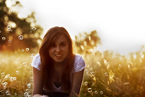 sunset portrait cute girl beautiful smile field happy bokeh dusk gorgeous wheat bubbles teen laugh brunette sunflare alyssaoliver