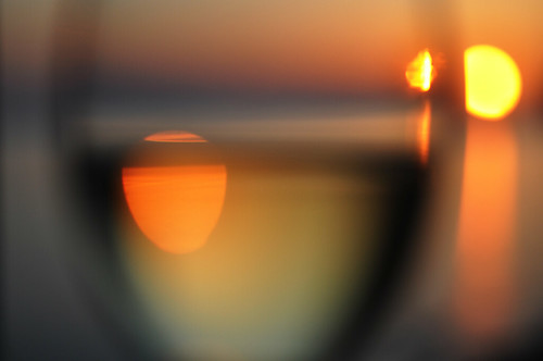 light sunset sea sun glass 50mm nikon wine bokeh refraction woolacombe d90